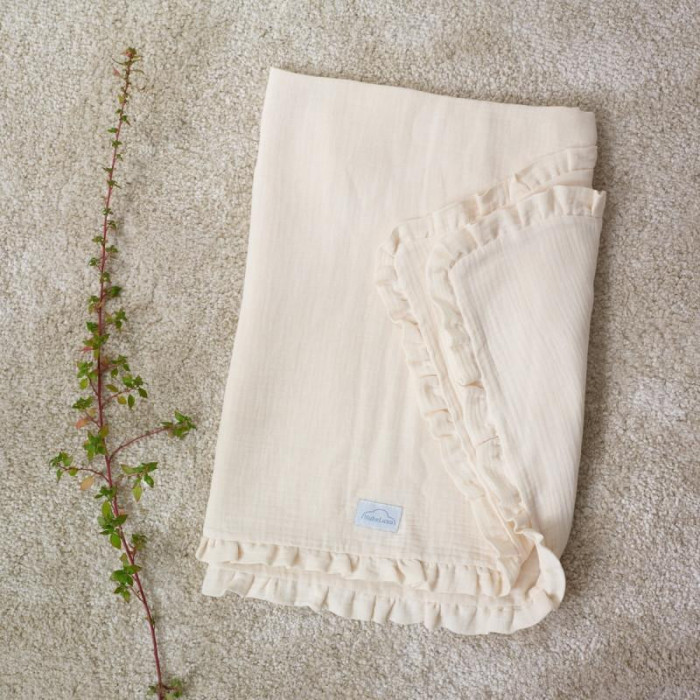 ARRULLO MUSELINA CON VOLANTE BEIG